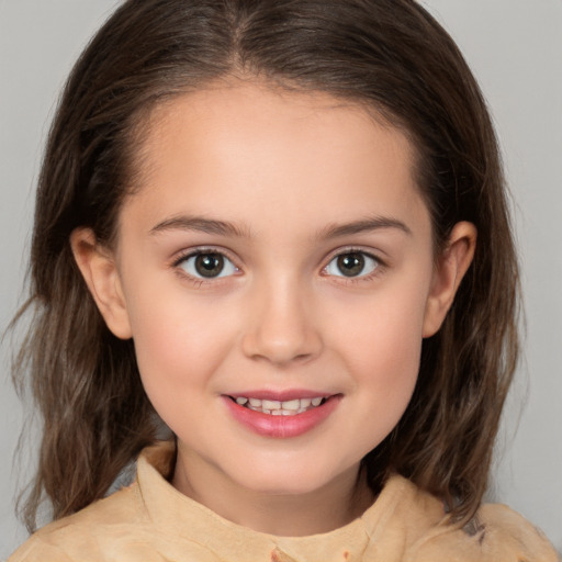 Joyful white child female with medium  brown hair and brown eyes