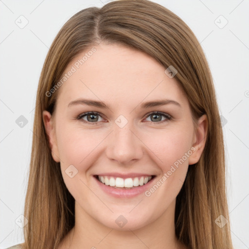 Joyful white young-adult female with long  brown hair and grey eyes