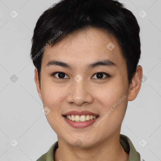 Joyful asian young-adult female with short  black hair and brown eyes