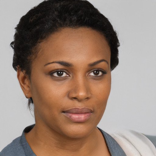 Neutral black young-adult female with short  brown hair and brown eyes