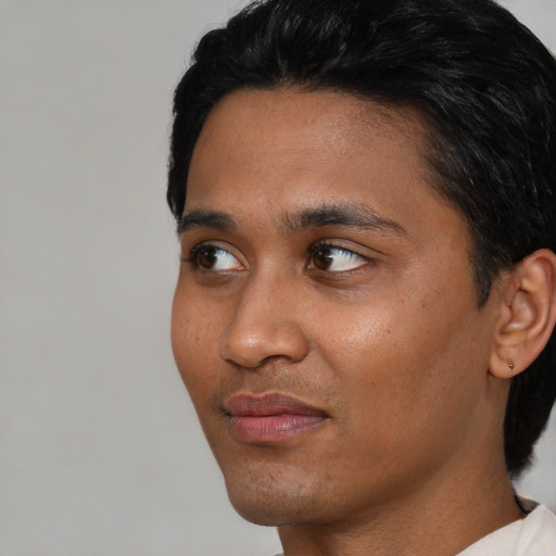 Neutral asian young-adult male with short  black hair and brown eyes