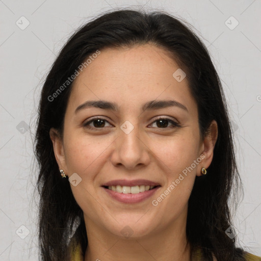 Joyful white adult female with long  brown hair and brown eyes