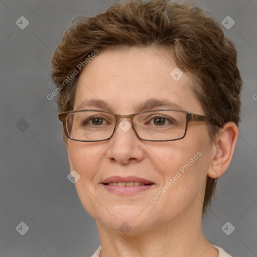 Joyful white adult female with short  brown hair and grey eyes