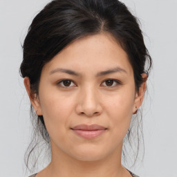 Joyful asian young-adult female with medium  brown hair and brown eyes