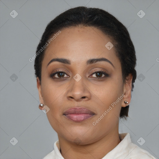 Joyful latino young-adult female with short  brown hair and brown eyes