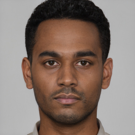 Neutral latino young-adult male with short  black hair and brown eyes