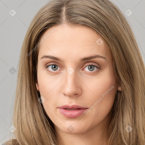 Neutral white young-adult female with long  brown hair and brown eyes