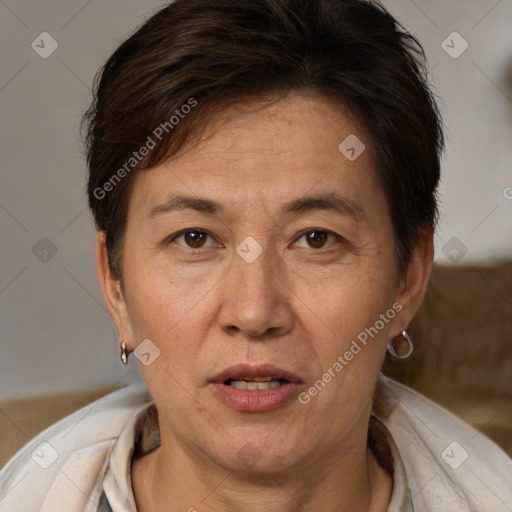 Joyful white adult female with short  brown hair and brown eyes