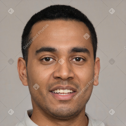 Joyful latino young-adult male with short  black hair and brown eyes