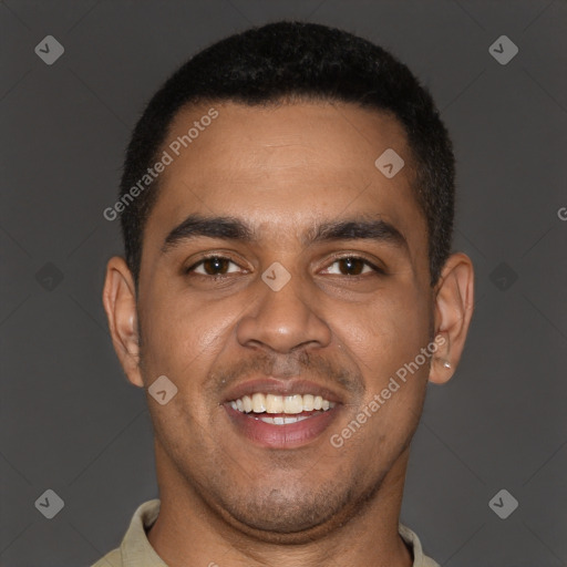 Joyful black young-adult male with short  brown hair and brown eyes