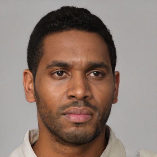 Neutral latino young-adult male with short  brown hair and brown eyes