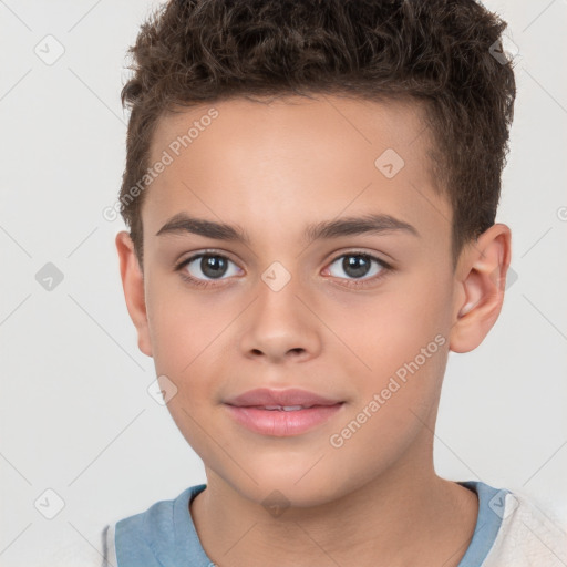 Joyful white child male with short  brown hair and brown eyes