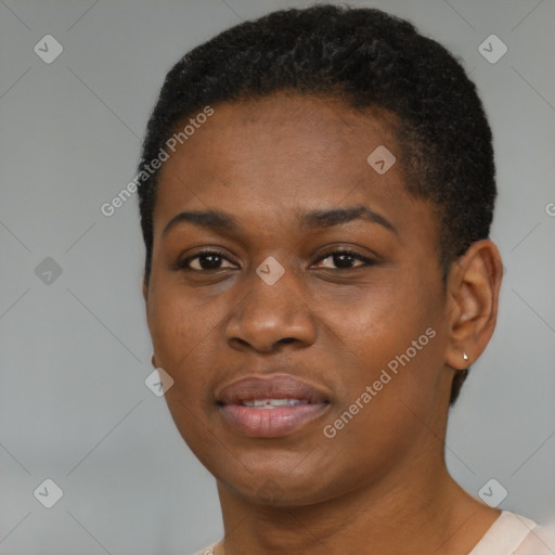 Joyful black young-adult female with short  black hair and brown eyes