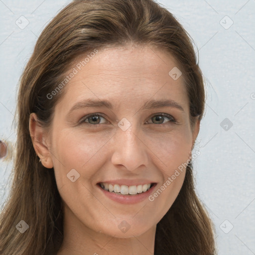 Joyful white young-adult female with long  brown hair and grey eyes