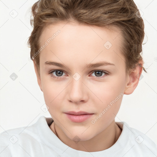 Joyful white child female with short  brown hair and brown eyes