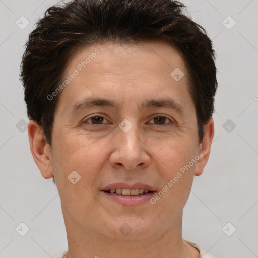 Joyful white adult male with short  brown hair and brown eyes