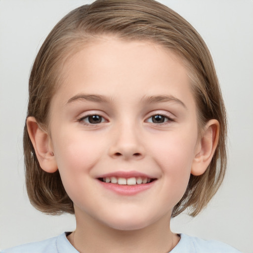 Joyful white child female with medium  brown hair and brown eyes