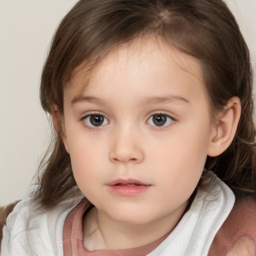 Neutral white child female with medium  brown hair and brown eyes