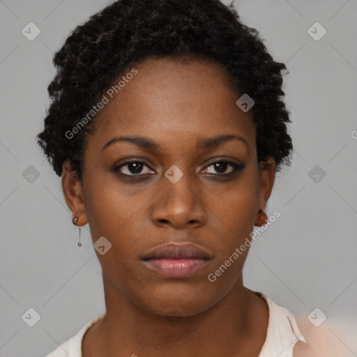 Neutral black young-adult female with short  brown hair and brown eyes