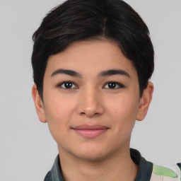 Joyful asian young-adult female with short  black hair and brown eyes