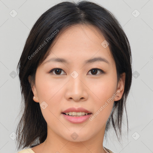 Joyful asian young-adult female with medium  brown hair and brown eyes