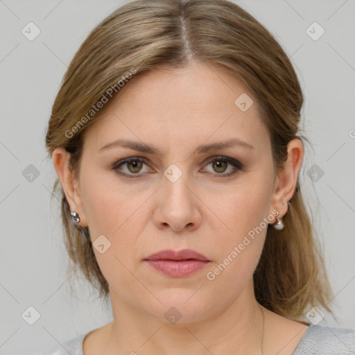 Joyful white young-adult female with medium  brown hair and blue eyes