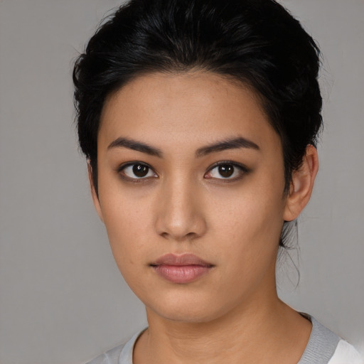 Neutral asian young-adult female with short  black hair and brown eyes