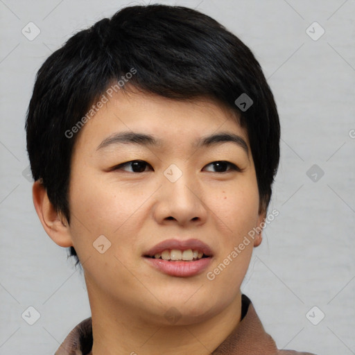 Joyful asian young-adult female with short  black hair and brown eyes