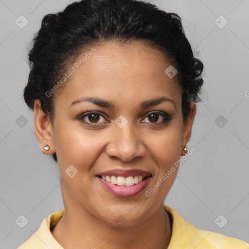 Joyful latino young-adult female with short  brown hair and brown eyes