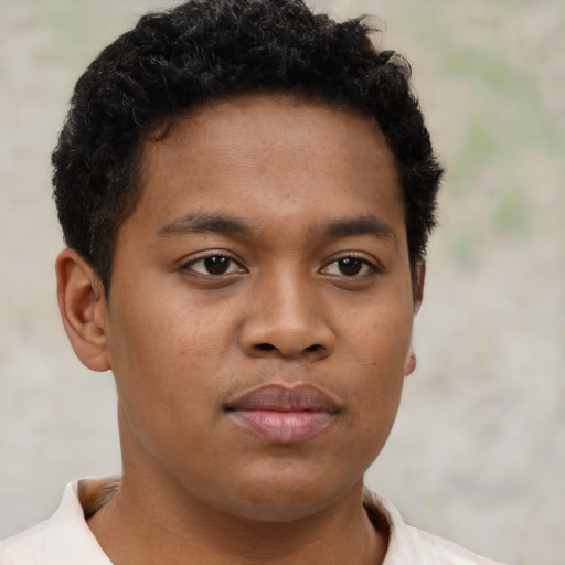 Neutral latino young-adult male with short  brown hair and brown eyes