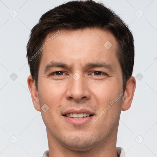 Joyful white young-adult male with short  brown hair and brown eyes