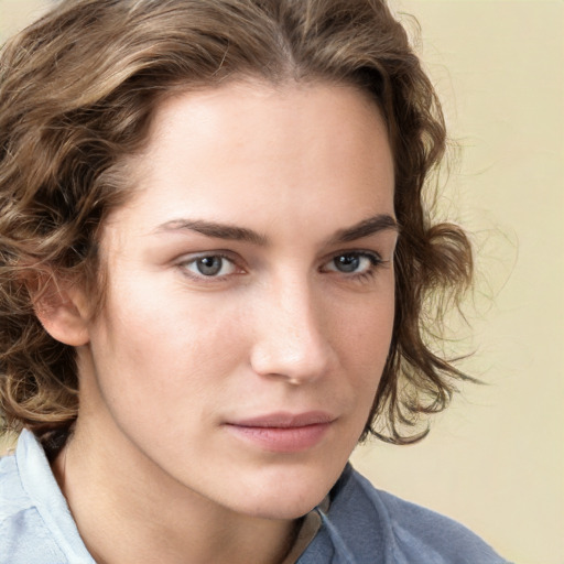 Neutral white young-adult female with medium  brown hair and blue eyes