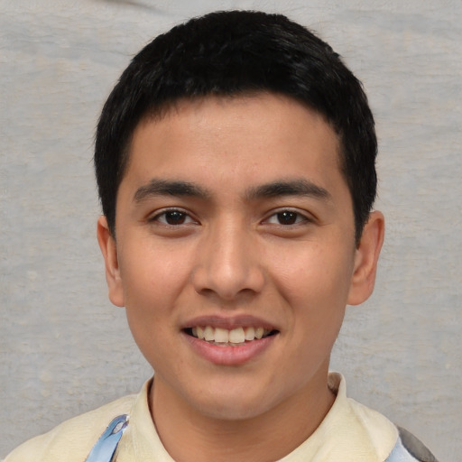 Joyful asian young-adult male with short  black hair and brown eyes