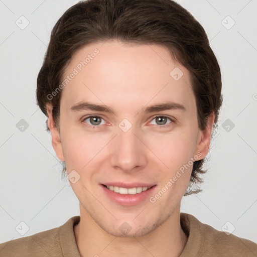 Joyful white young-adult female with short  brown hair and grey eyes