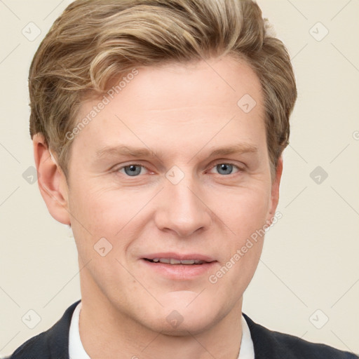 Joyful white adult male with short  brown hair and grey eyes