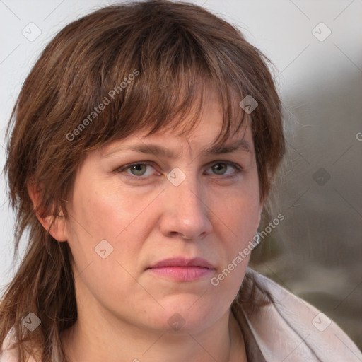 Joyful white adult female with medium  brown hair and grey eyes