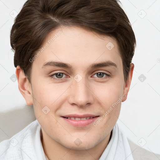 Joyful white young-adult female with short  brown hair and grey eyes