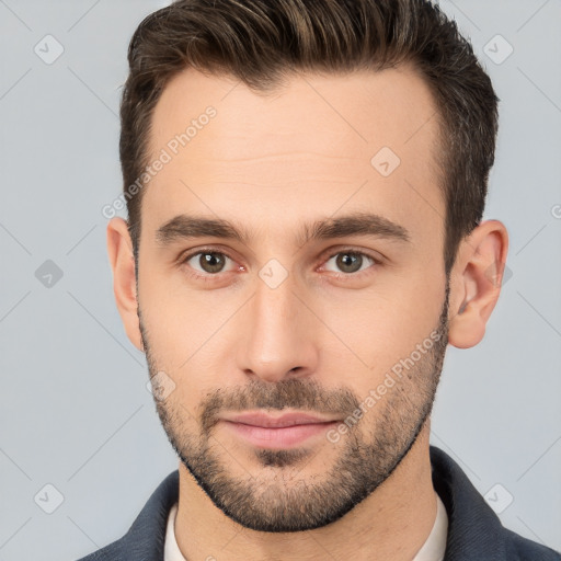 Neutral white young-adult male with short  brown hair and brown eyes