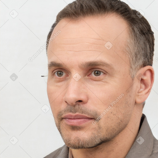 Neutral white adult male with short  brown hair and brown eyes