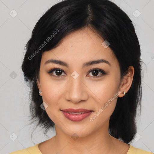 Joyful latino young-adult female with medium  black hair and brown eyes