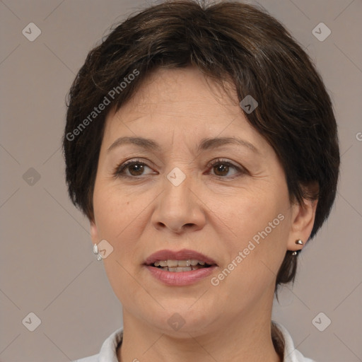 Joyful white adult female with medium  brown hair and brown eyes