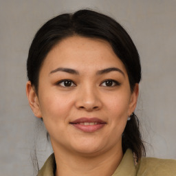 Joyful asian young-adult female with medium  brown hair and brown eyes