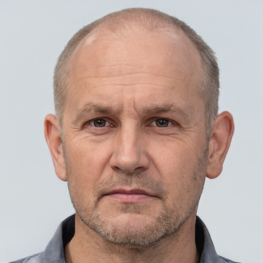 Neutral white middle-aged male with short  brown hair and brown eyes