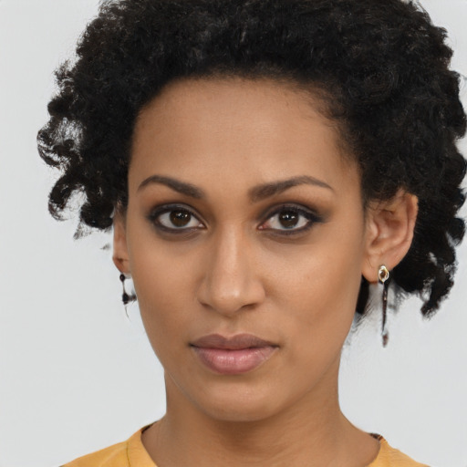Neutral black young-adult female with short  brown hair and brown eyes