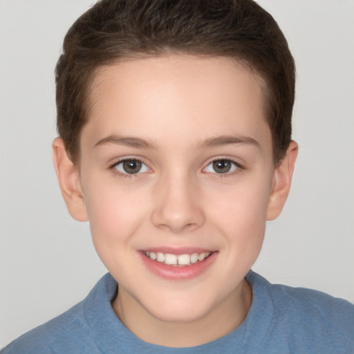 Joyful white child female with short  brown hair and brown eyes