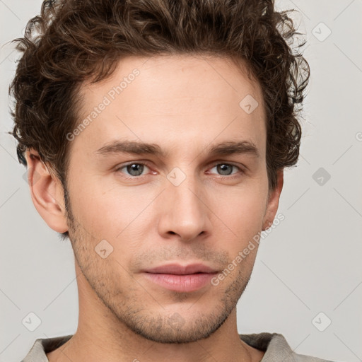 Neutral white young-adult male with short  brown hair and grey eyes