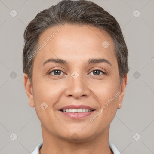 Joyful white young-adult female with short  brown hair and brown eyes