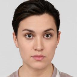 Neutral white young-adult female with short  brown hair and brown eyes