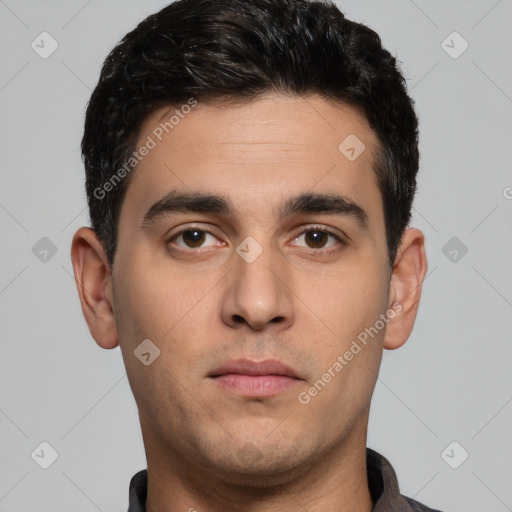Neutral white young-adult male with short  black hair and brown eyes