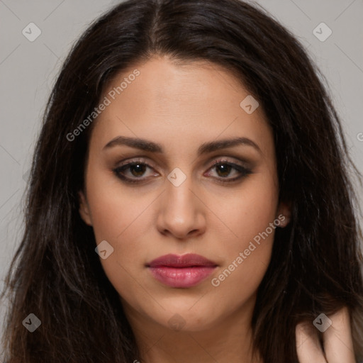 Joyful latino young-adult female with long  brown hair and brown eyes